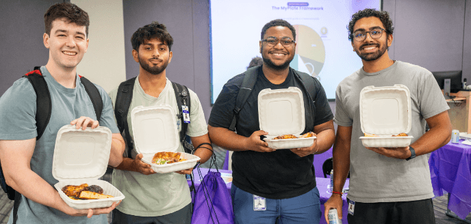 Students enjoying a free meal at the 2026 Back-to-School Health Fair